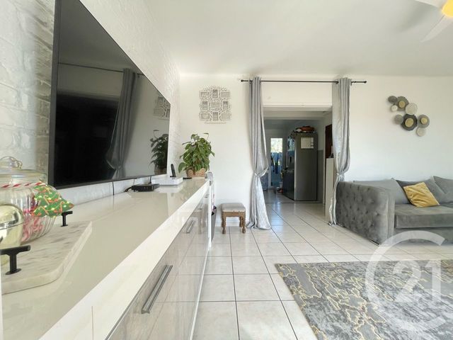 Afficher la photo en grand Appartement T4 à vendre - 4 pièces - 79.09 m2 - LUNEL - 34 - LANGUEDOC-ROUSSILLON - Century 21 Pays De Lunel
