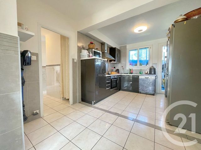 Afficher la photo en grand Appartement T4 à vendre - 4 pièces - 79.09 m2 - LUNEL - 34 - LANGUEDOC-ROUSSILLON - Century 21 Pays De Lunel