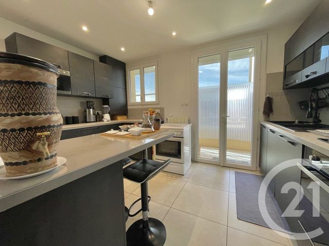 Appartement T4 à vendre - 4 pièces - 78.69 m2 - LUNEL - 34 - LANGUEDOC-ROUSSILLON - Century 21 Pays De Lunel