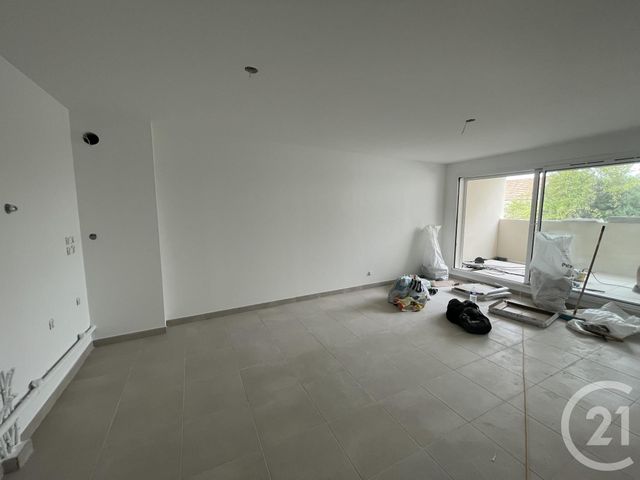 Appartement F3 à vendre - 3 pièces - 65.24 m2 - LUNEL - 34 - LANGUEDOC-ROUSSILLON - Century 21 Pays De Lunel