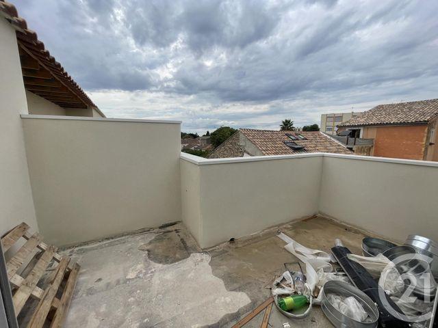 Afficher la photo en grand Appartement F3 à vendre - 3 pièces - 68.88 m2 - LUNEL - 34 - LANGUEDOC-ROUSSILLON - Century 21 Pays De Lunel