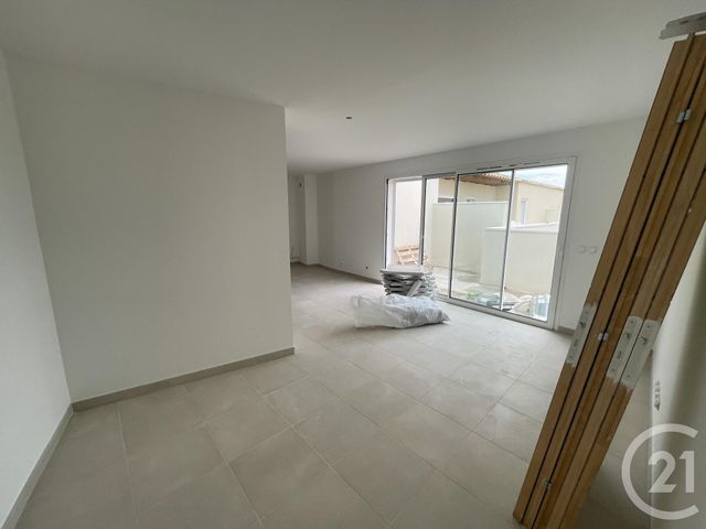Appartement F3 à vendre - 3 pièces - 68.88 m2 - LUNEL - 34 - LANGUEDOC-ROUSSILLON - Century 21 Pays De Lunel