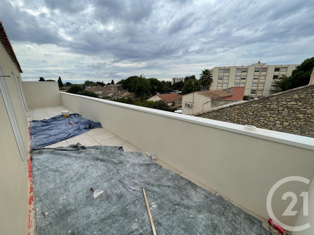 Afficher la photo en grand Appartement F3 à vendre - 3 pièces - 55.93 m2 - LUNEL - 34 - LANGUEDOC-ROUSSILLON - Century 21 Pays De Lunel
