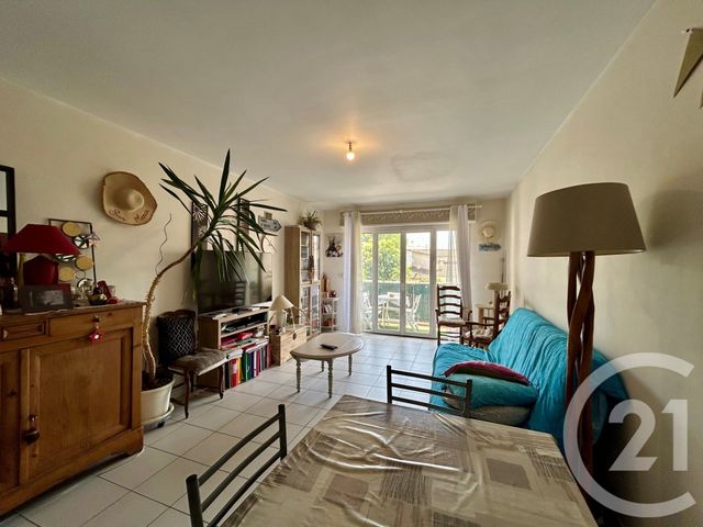 Afficher la photo en grand Appartement F3 à vendre - 3 pièces - 76.59 m2 - LUNEL - 34 - LANGUEDOC-ROUSSILLON - Century 21 Pays De Lunel