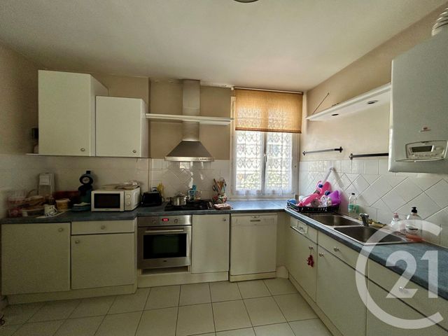Afficher la photo en grand Appartement F3 à vendre - 3 pièces - 76.59 m2 - LUNEL - 34 - LANGUEDOC-ROUSSILLON - Century 21 Pays De Lunel