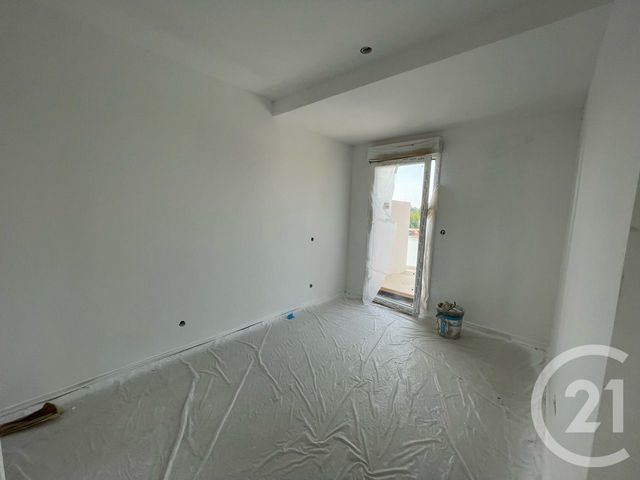 Afficher la photo en grand Appartement F3 à vendre - 3 pièces - 62.18 m2 - LUNEL - 34 - LANGUEDOC-ROUSSILLON - Century 21 Pays De Lunel