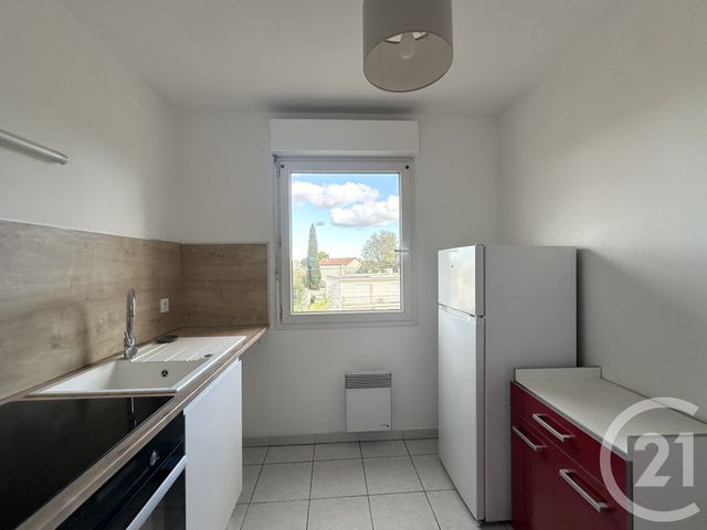 Appartement F2 à louer - 2 pièces - 42.35 m2 - LUNEL - 34 - LANGUEDOC-ROUSSILLON - Century 21 Pays De Lunel