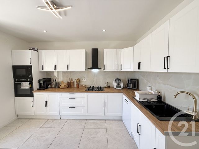 maison à vendre - 4 pièces - 114.82 m2 - LUNEL - 34 - LANGUEDOC-ROUSSILLON - Century 21 Pays De Lunel