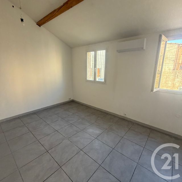 Appartement F1 bis à louer - 2 pièces - 52.04 m2 - LUNEL - 34 - LANGUEDOC-ROUSSILLON - Century 21 Pays De Lunel