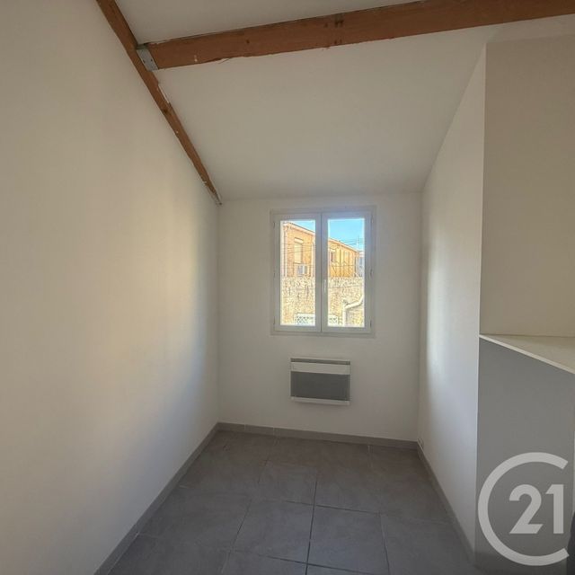 Appartement F1 bis à louer - 2 pièces - 52.04 m2 - LUNEL - 34 - LANGUEDOC-ROUSSILLON - Century 21 Pays De Lunel