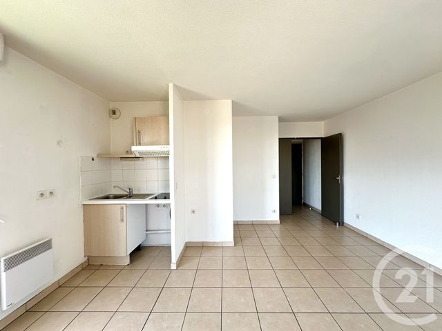 Appartement F2 à louer - 2 pièces - 46.96 m2 - LUNEL - 34 - LANGUEDOC-ROUSSILLON - Century 21 Pays De Lunel