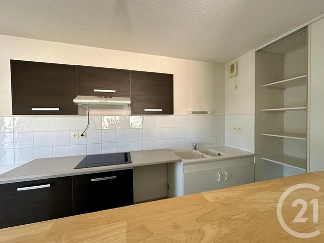 Appartement F3 à louer - 3 pièces - 60.15 m2 - LUNEL - 34 - LANGUEDOC-ROUSSILLON - Century 21 Pays De Lunel