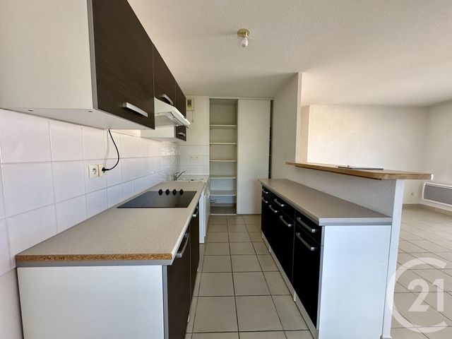 Appartement F3 à louer - 3 pièces - 60.15 m2 - LUNEL - 34 - LANGUEDOC-ROUSSILLON - Century 21 Pays De Lunel