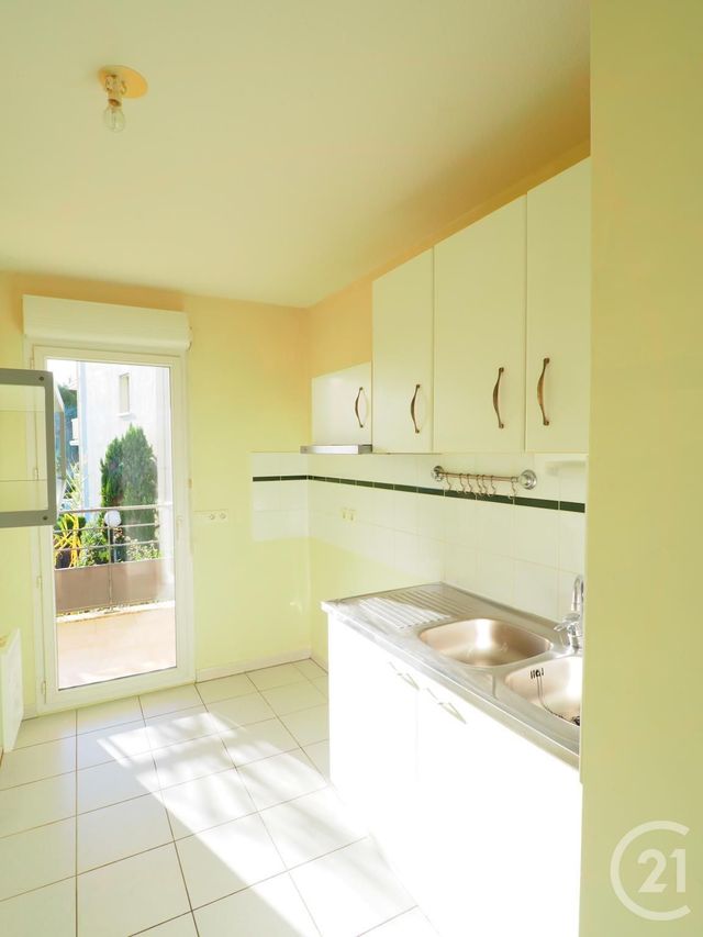 Appartement F3 à louer - 3 pièces - 63.25 m2 - LUNEL - 34 - LANGUEDOC-ROUSSILLON - Century 21 Pays De Lunel