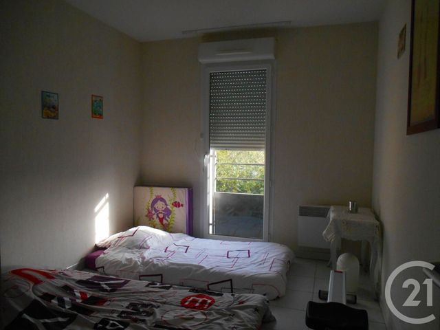 Appartement F3 à louer - 3 pièces - 63.25 m2 - LUNEL - 34 - LANGUEDOC-ROUSSILLON - Century 21 Pays De Lunel