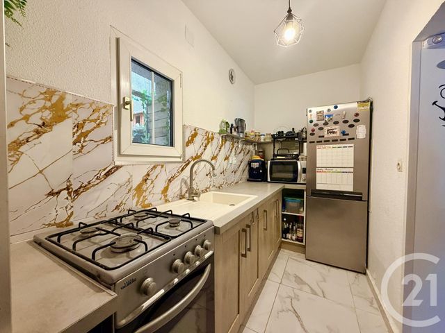 Appartement T2 à vendre - 3 pièces - 57.76 m2 - LUNEL - 34 - LANGUEDOC-ROUSSILLON - Century 21 Pays De Lunel