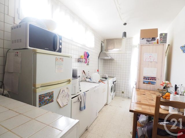 Appartement T2 à louer - 2 pièces - 46.27 m2 - LUNEL - 34 - LANGUEDOC-ROUSSILLON - Century 21 Pays De Lunel