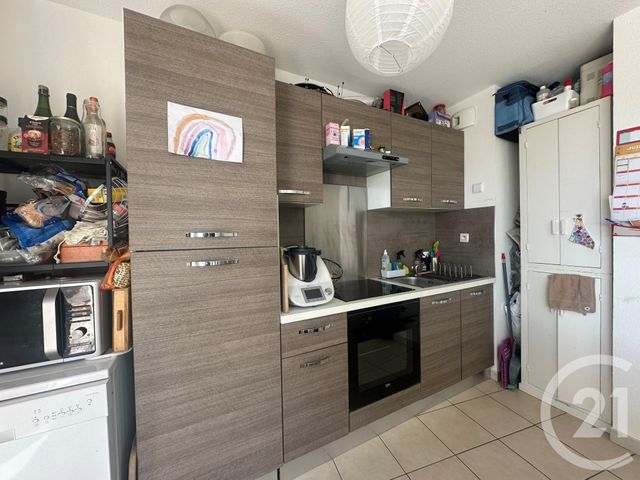 Appartement F3 à louer - 3 pièces - 64.52 m2 - AIMARGUES - 30 - LANGUEDOC-ROUSSILLON - Century 21 Pays De Lunel
