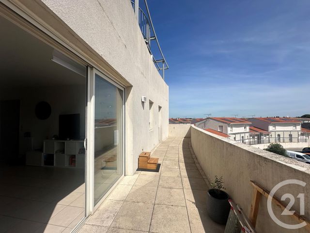 Appartement F3 à louer - 3 pièces - 64.52 m2 - AIMARGUES - 30 - LANGUEDOC-ROUSSILLON - Century 21 Pays De Lunel