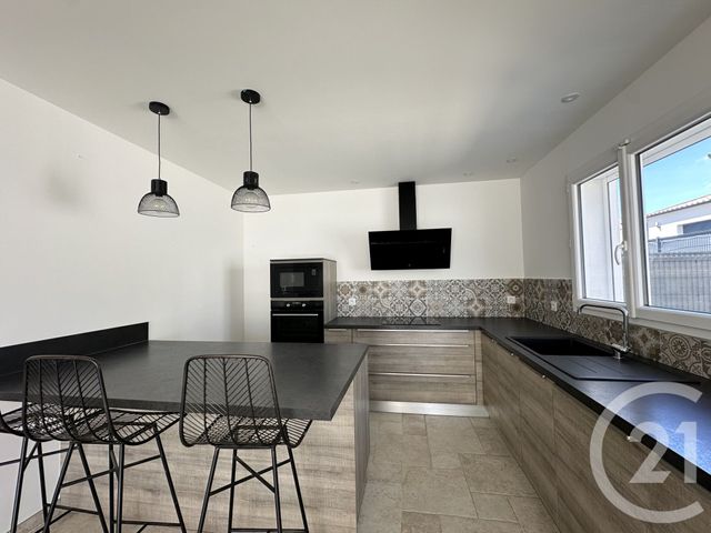 maison à louer - 4 pièces - 91.09 m2 - NAGES ET SOLORGUES - 30 - LANGUEDOC-ROUSSILLON - Century 21 Pays De Lunel