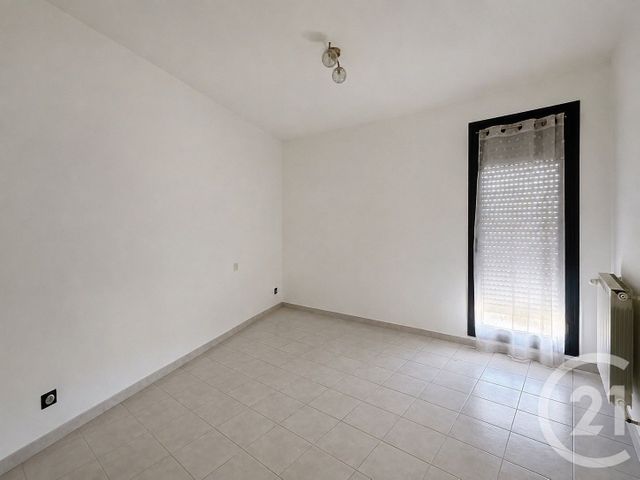Appartement T3 à louer - 3 pièces - 71.29 m2 - LUNEL - 34 - LANGUEDOC-ROUSSILLON - Century 21 Pays De Lunel
