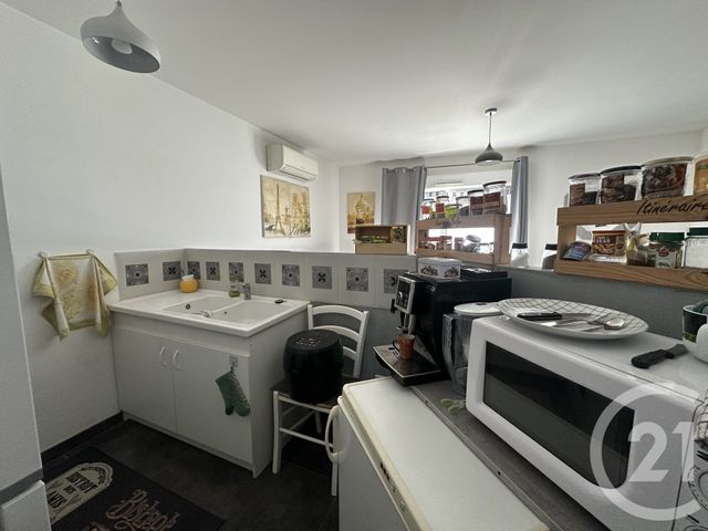 Appartement F2 bis à louer - 3 pièces - 54.11 m2 - LUNEL - 34 - LANGUEDOC-ROUSSILLON - Century 21 Pays De Lunel