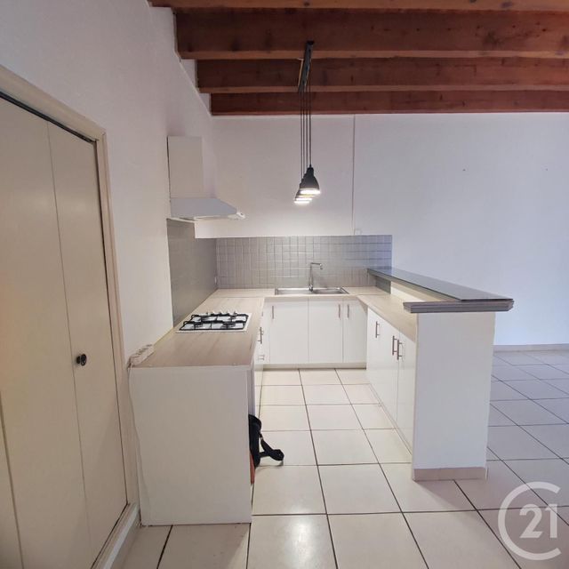 Appartement F2 à louer - 2 pièces - 48.56 m2 - CALVISSON - 30 - LANGUEDOC-ROUSSILLON - Century 21 Pays De Lunel