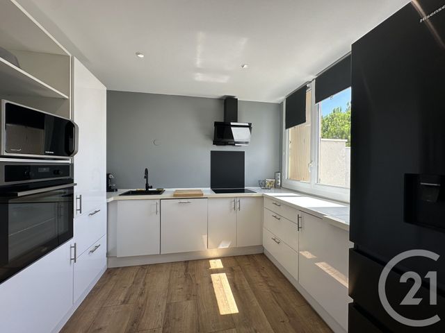 Appartement F4 à louer - 4 pièces - 78.63 m2 - LUNEL - 34 - LANGUEDOC-ROUSSILLON - Century 21 Pays De Lunel