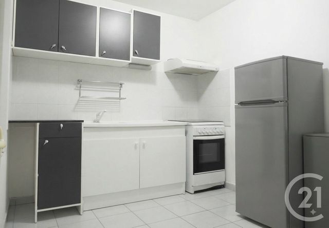 Appartement F3 à louer - 3 pièces - 61.84 m2 - UCHAUD - 30 - LANGUEDOC-ROUSSILLON - Century 21 Pays De Lunel