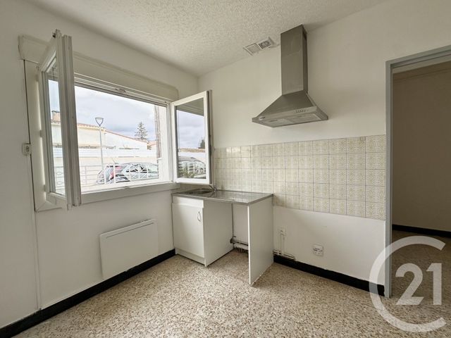 maison à louer - 2 pièces - 51.65 m2 - LUNEL - 34 - LANGUEDOC-ROUSSILLON - Century 21 Pays De Lunel