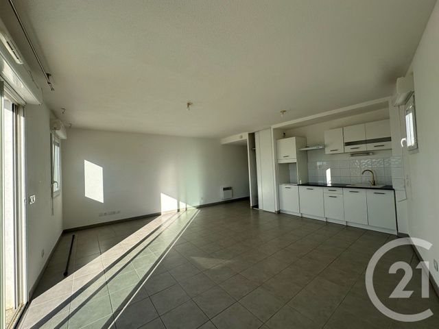 Appartement F3 à louer - 3 pièces - 64.62 m2 - AIMARGUES - 30 - LANGUEDOC-ROUSSILLON - Century 21 Pays De Lunel