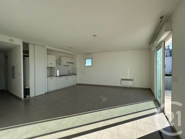 Appartement F3 à louer - 3 pièces - 64.62 m2 - AIMARGUES - 30 - LANGUEDOC-ROUSSILLON - Century 21 Pays De Lunel