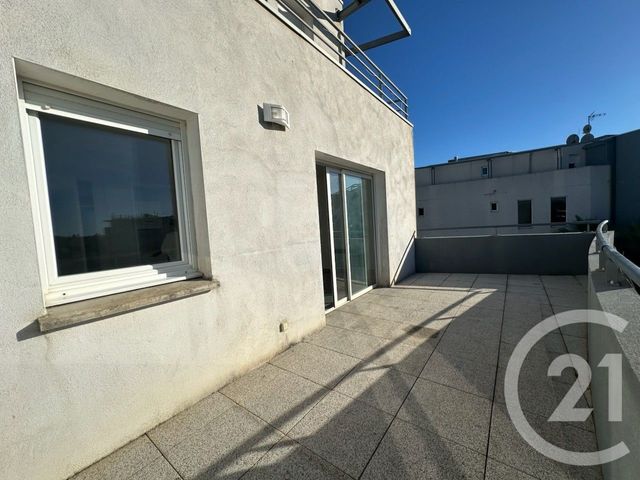 Appartement F3 à louer - 3 pièces - 64.62 m2 - AIMARGUES - 30 - LANGUEDOC-ROUSSILLON - Century 21 Pays De Lunel